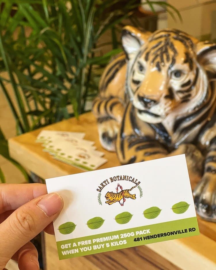 Sakti Botanicals loyalty cards at the Asheville shop